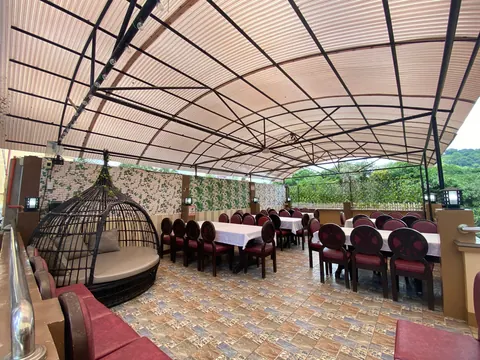 The covered terrace set for a gathering
